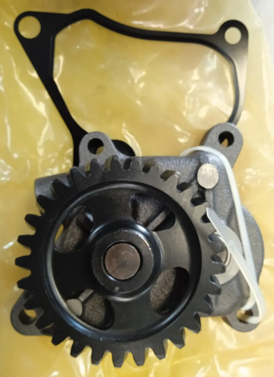 Pompa oleju ISUZU 4HK1 CASE DENYO FIAT HIDROMEK HITACHI ​​​​​​​IHI JCB JOHN DEERE LBX NEW HOLLAND SANY SUNWARD SUMITOMO TCM