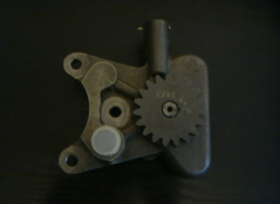 Pompa oleju PERKINS 3.152 AHLMANN CATERPILLAR COMPAIR HOLDER LANDINI