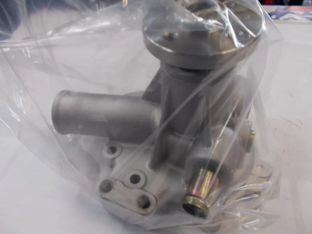 Pompa wody PERKINS 404D-22 403D-15 404D-15 403D-17 404C-22T 103.10 103.15 SHIBAURA N844 N843 MASSEY ATLAS CASE FORD GEHL JCB NEW HOLLAND WEIDEMANN